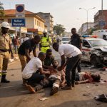 Create an editorial news illustration for an article about 'Brazzaville : solidarité citoyenne après un violent accident sur l’avenue Nelson Mandela'. The specific country is Republique du Congo (Brazzaville) (CG); make visual cues accurate to this e